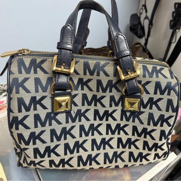 MK bag gray with navy blue logo used in good condition 
Is 10” x 6 1/2” - Picture 2 of 8